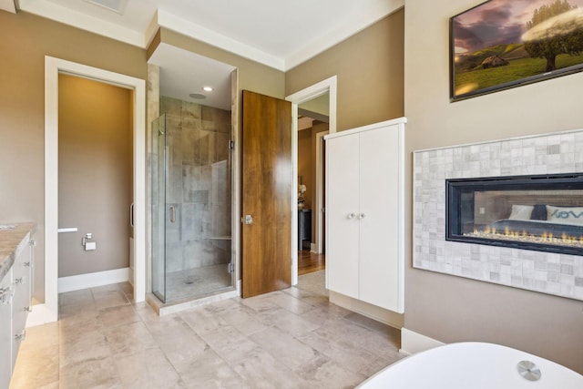 bathroom with tile patterned flooring, vanity, and an enclosed shower