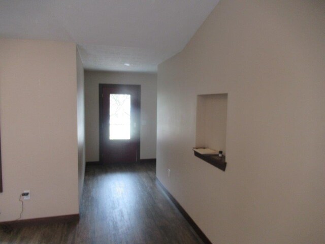 hall featuring dark hardwood / wood-style floors