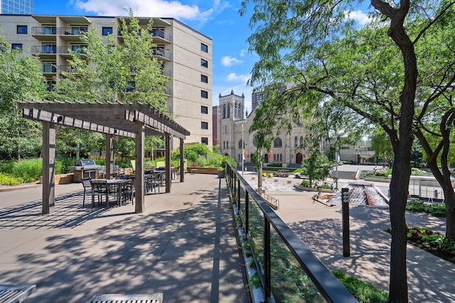 view of property's community featuring a pergola