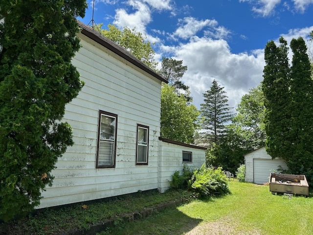 view of home's exterior with a lawn