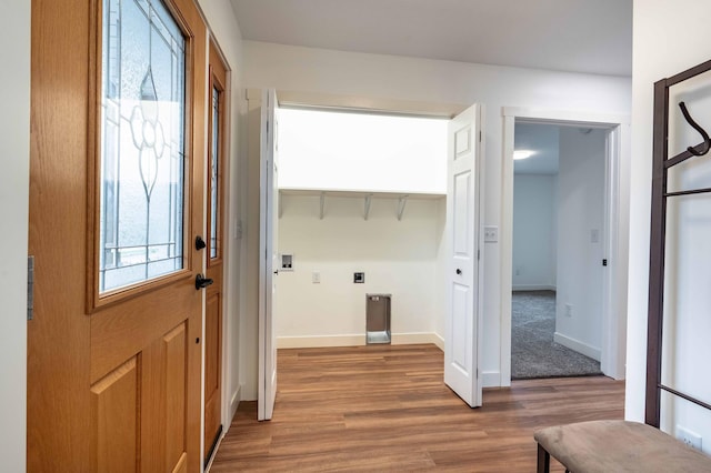 laundry area featuring hardwood / wood-style flooring, washer hookup, and hookup for an electric dryer