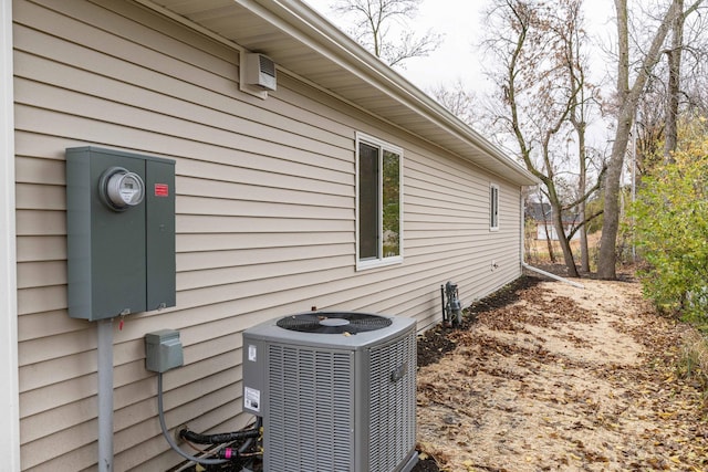 view of property exterior with central air condition unit