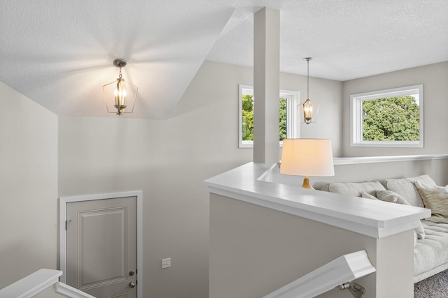 interior space featuring a textured ceiling