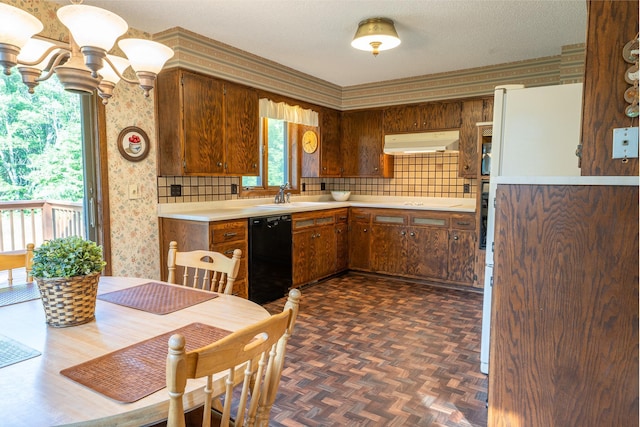 kitchen with dishwasher, sink, dark parquet floors, backsplash, and a textured ceiling