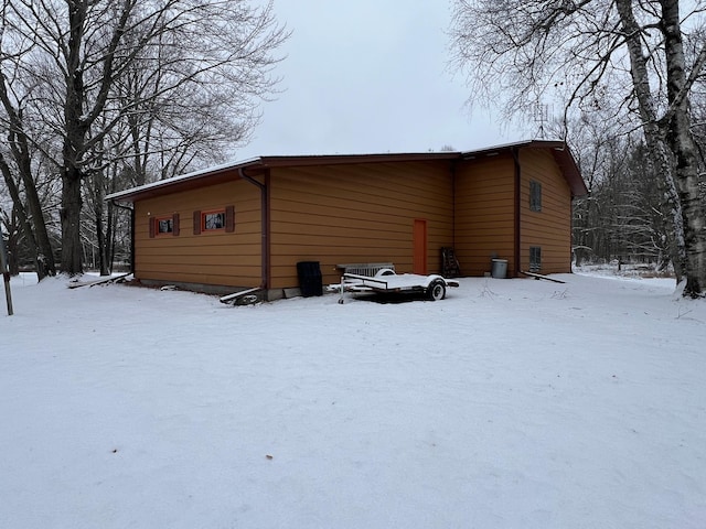 view of snow covered house