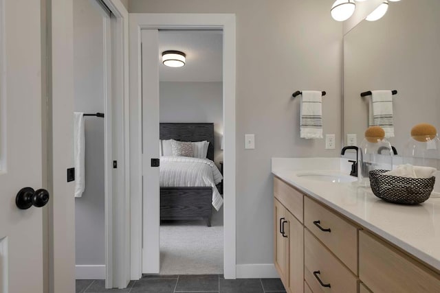 bathroom featuring vanity and tile patterned flooring