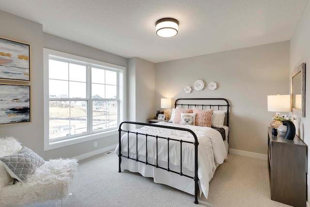 bedroom featuring carpet flooring