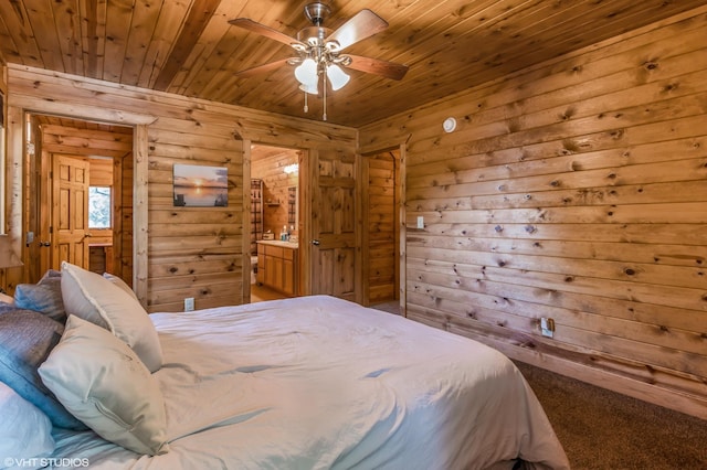 carpeted bedroom featuring wooden ceiling