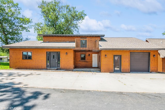 log home with a garage