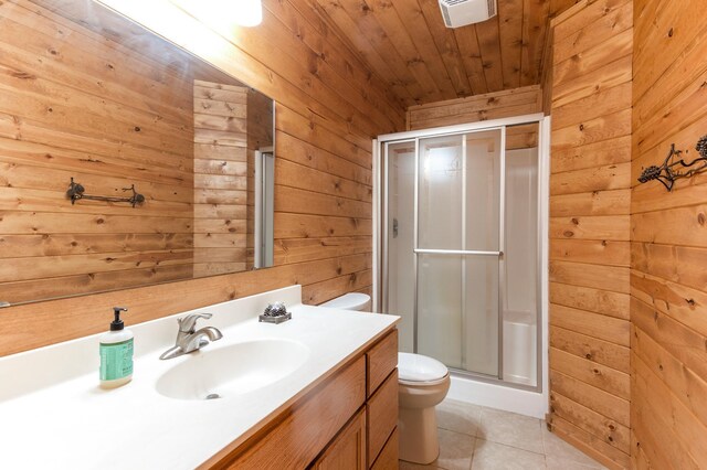 bathroom with a shower with shower door, wood walls, tile patterned flooring, wood ceiling, and toilet