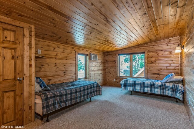 carpeted bedroom with lofted ceiling, a wall unit AC, wood ceiling, and wood walls