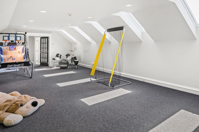 exercise room with lofted ceiling