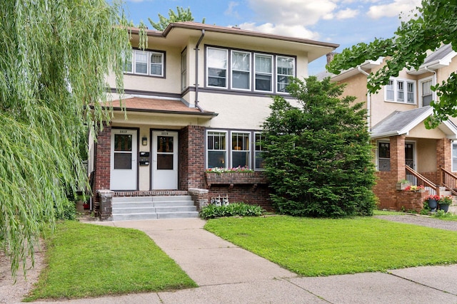 view of front facade with a front yard