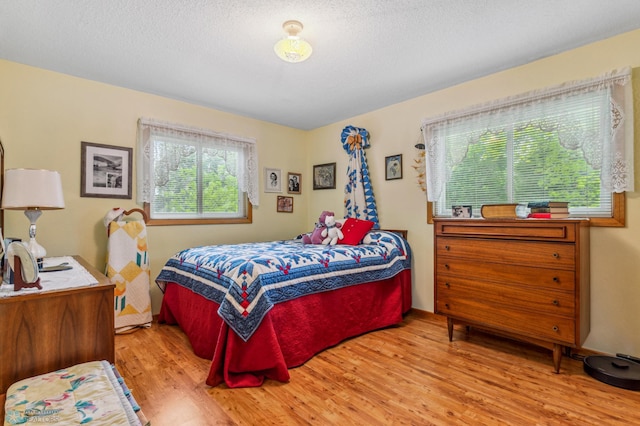 bedroom featuring wood-type flooring