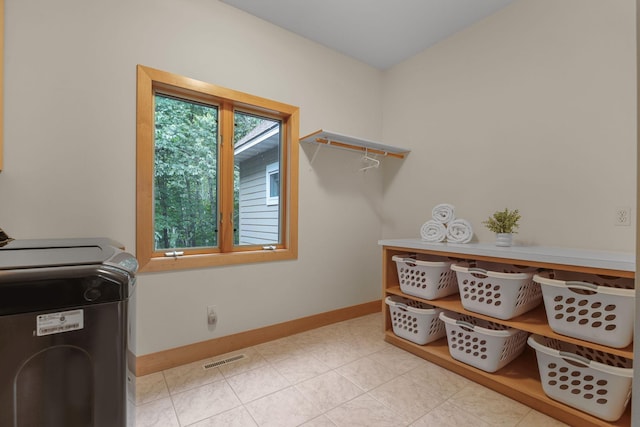 washroom with washer and dryer