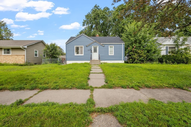 view of front facade with a front yard