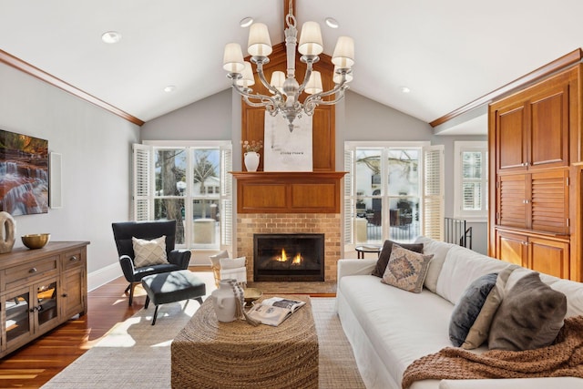 living area featuring recessed lighting, baseboards, vaulted ceiling, a brick fireplace, and dark wood-style floors