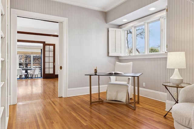 sitting room with crown molding, recessed lighting, wood finished floors, and baseboards