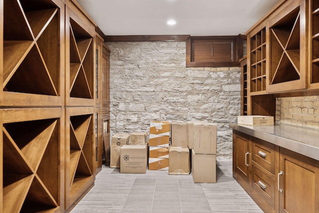 wine room with light tile patterned floors