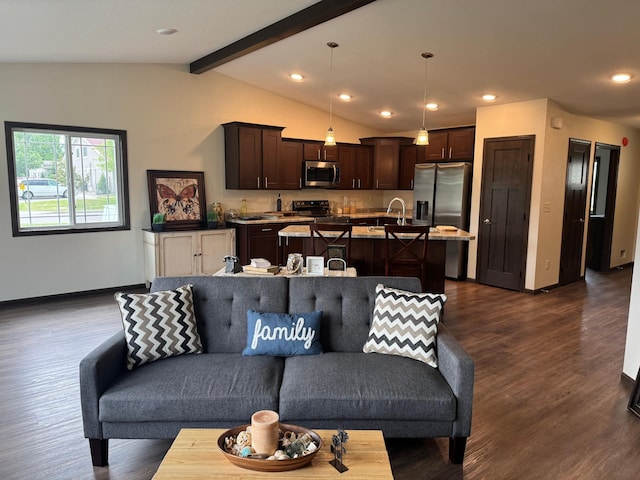 1615 30th St NW Unit 31, Bemidji, MN 56601 - living area featuring baseboards, dark wood-style flooring, and recessed lighting