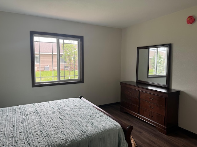 1615 30th St NW Unit 31, Bemidji, MN 56601 - bedroom featuring dark wood-type flooring