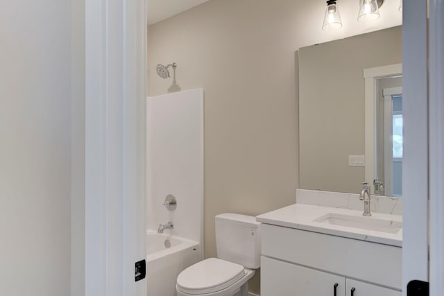 full bathroom with vanity, tub / shower combination, and toilet