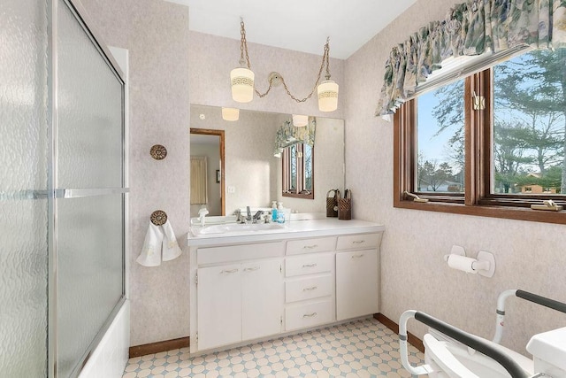 bathroom featuring vanity, a bidet, tile patterned flooring, and shower / bath combination with glass door