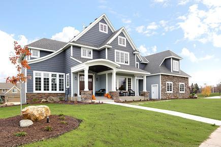 rear view of house with a lawn