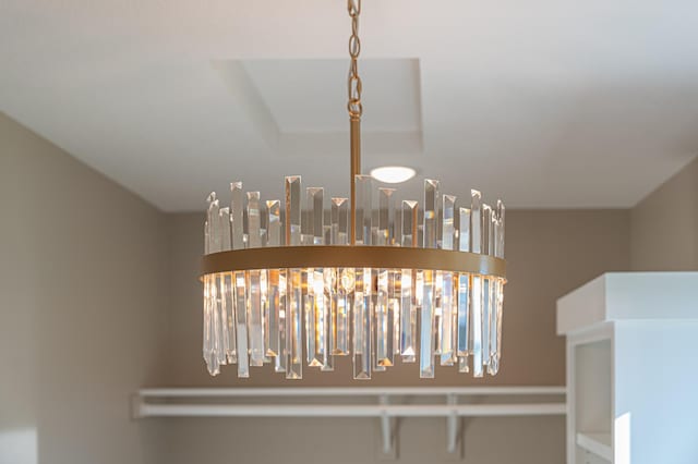 details featuring an inviting chandelier