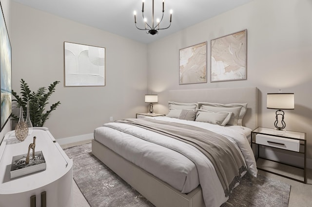 1 Hill Farm Rd Unit 205, North Oaks, MN 55127 - bedroom with light carpet, baseboards, and a chandelier