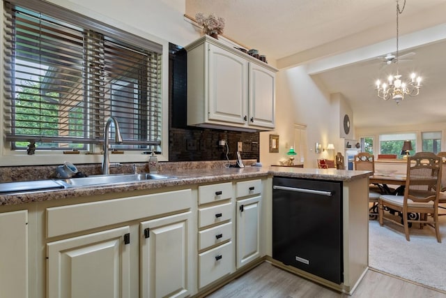 kitchen featuring lofted ceiling with beams, dishwasher, light hardwood / wood-style floors, and sink