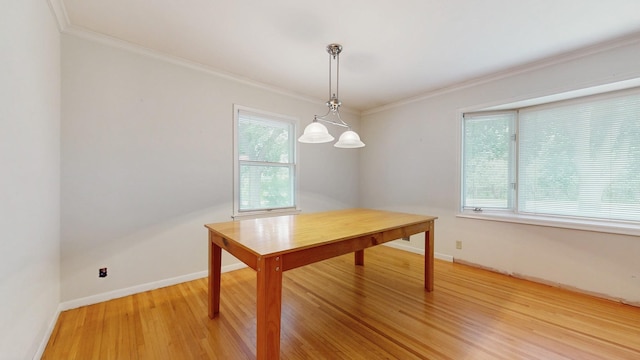 4200 Overlook Dr, Bloomington, MN 55437 - dining space with light wood-style flooring and ornamental molding