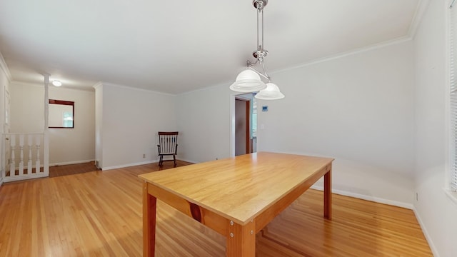 4200 Overlook Dr, Bloomington, MN 55437 - dining room with light wood finished floors and crown molding