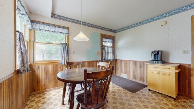 4200 Overlook Dr, Bloomington, MN 55437 - dining room featuring a wainscoted wall and wooden walls