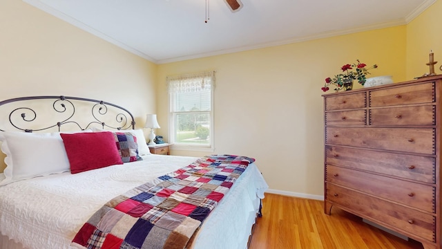 4200 Overlook Dr, Bloomington, MN 55437 - bedroom with ornamental molding, light wood-style flooring, and ceiling fan