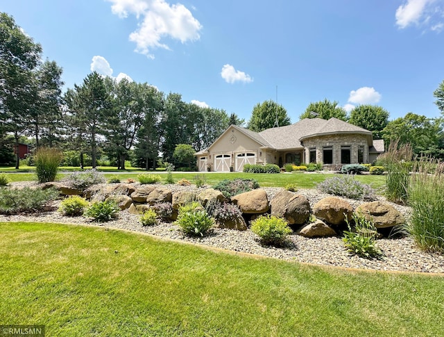 exterior space with a front yard