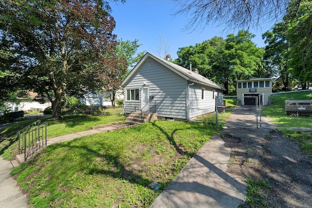 view of home's exterior featuring a lawn