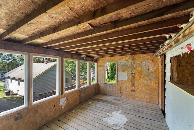 unfurnished sunroom with a healthy amount of sunlight