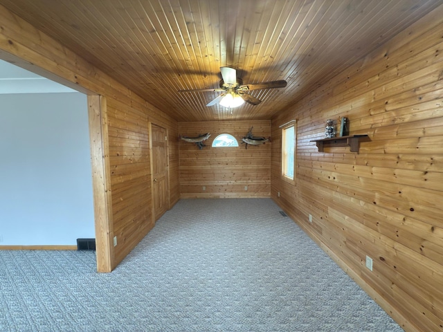 625 10th St, Montevideo, MN 56265 - interior space featuring carpet floors, wood walls, and ceiling fan