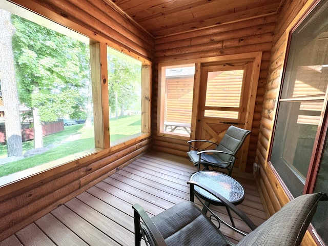 sunroom / solarium featuring plenty of natural light