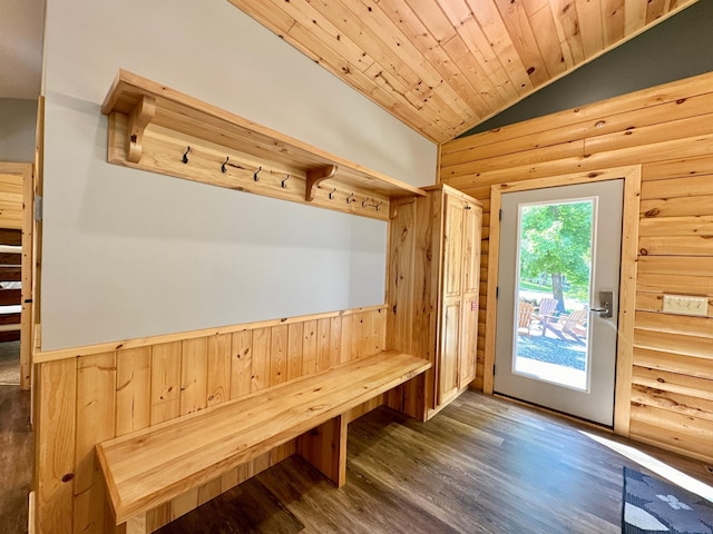 mudroom with wooden walls, dark hardwood / wood-style flooring, wooden ceiling, and lofted ceiling