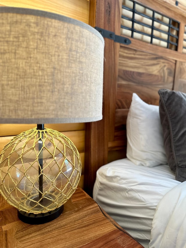 bedroom with wooden walls