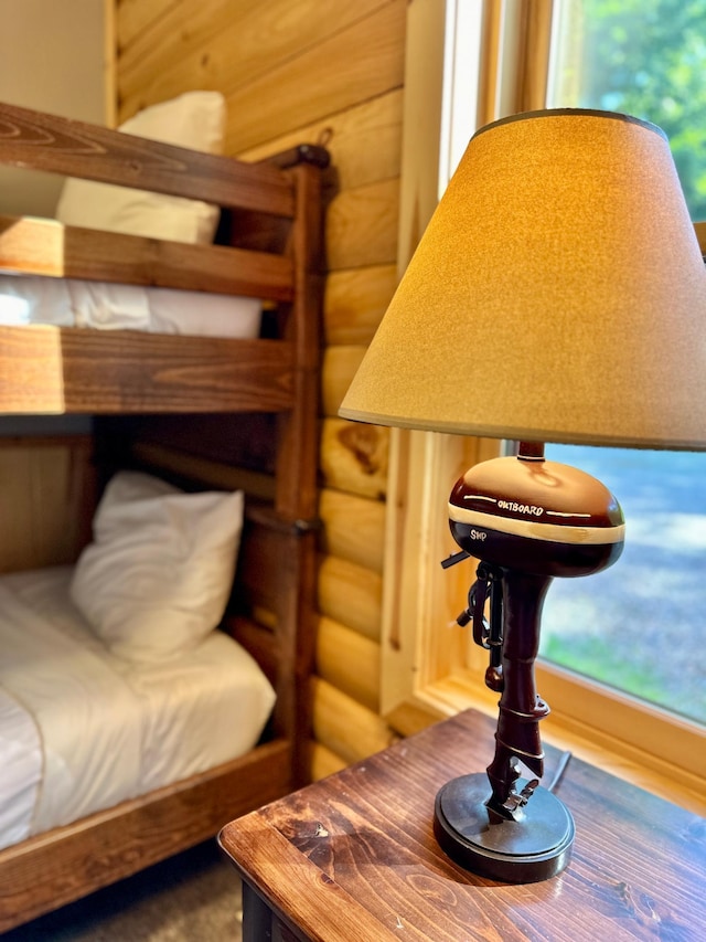 bedroom with wooden walls