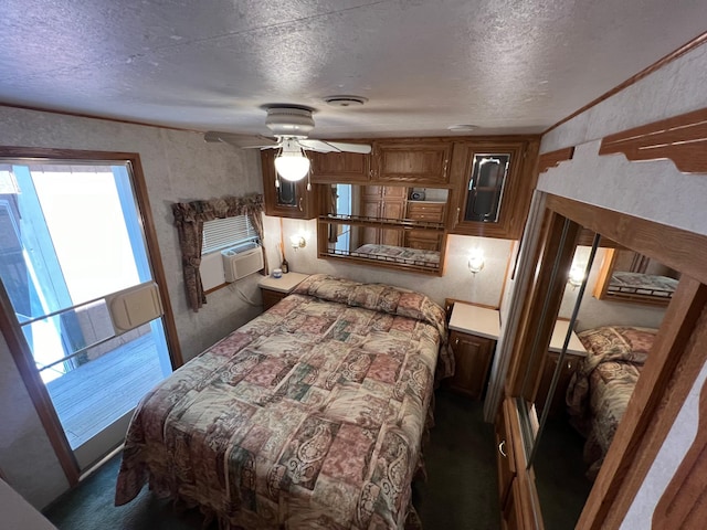 carpeted bedroom featuring ceiling fan, cooling unit, ornamental molding, vaulted ceiling, and a textured ceiling