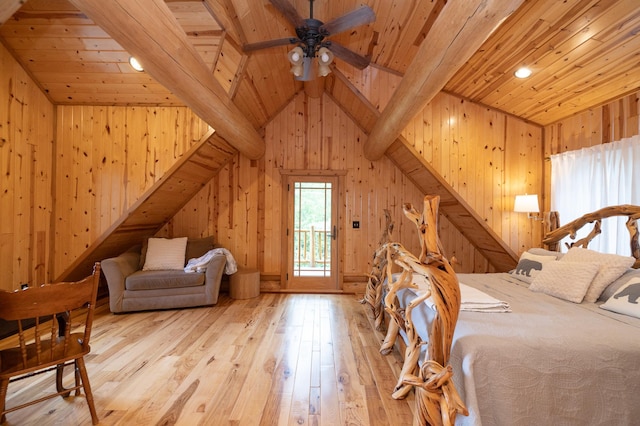 bedroom featuring access to outside, light hardwood / wood-style flooring, wood ceiling, and vaulted ceiling with beams