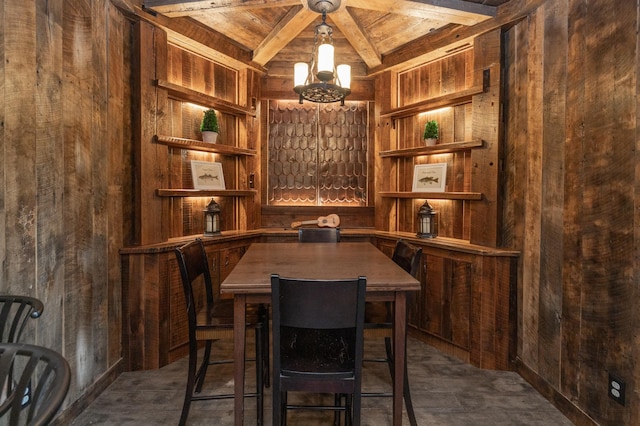 wine room featuring a notable chandelier, wood ceiling, wood walls, and beam ceiling