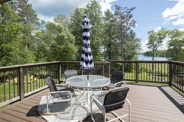 deck featuring a water view