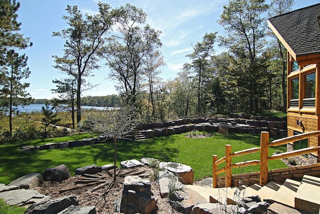 view of yard with a water view