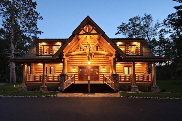 log home with a porch