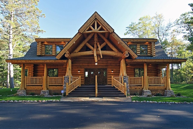 cabin featuring covered porch